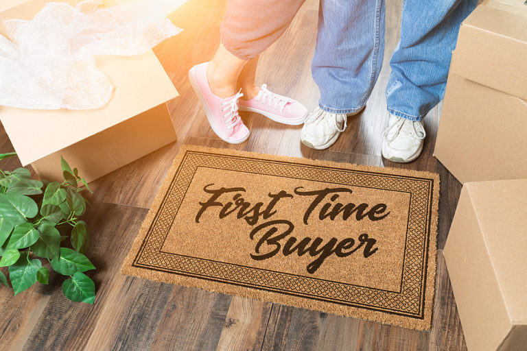 Man and Woman Unpacking Near Our First Time Buyer Welcome Mat, M First Time Home Buyer